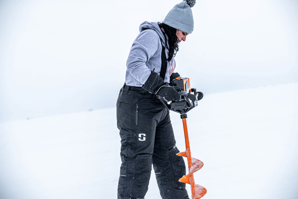 Lifestyle Image of Women Ice Fishing Wearing StrikerICE Prism Pants