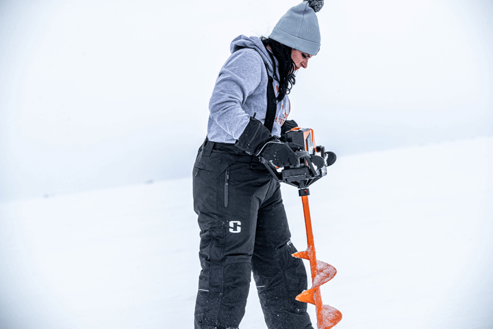 Lifestyle Image of Women Ice Fishing Wearing StrikerICE Prism Pants